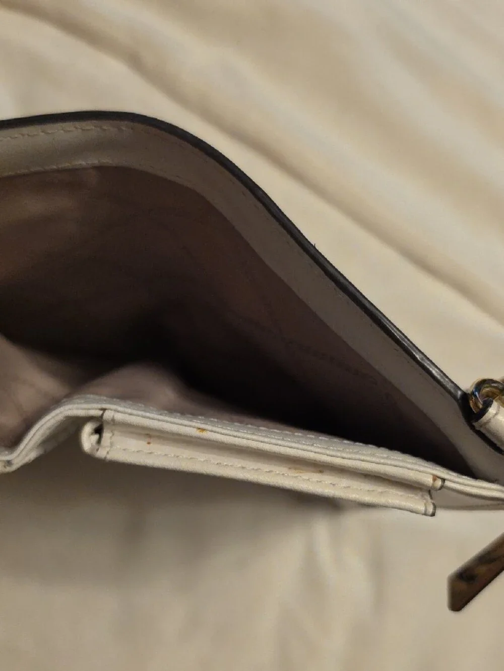 Michael Kors Cream Embossed Wristlet with Gold Accents
